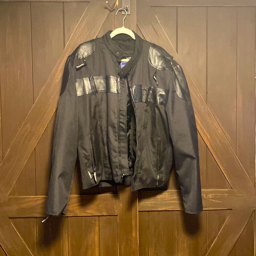 Nexgen XL black with leather accents biker jacket. Thinsulate insulation.